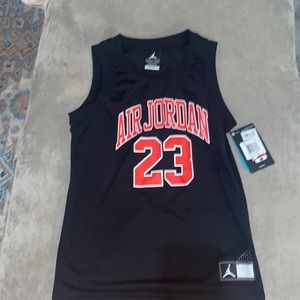 Blue and Red Jordan 23 jersey.